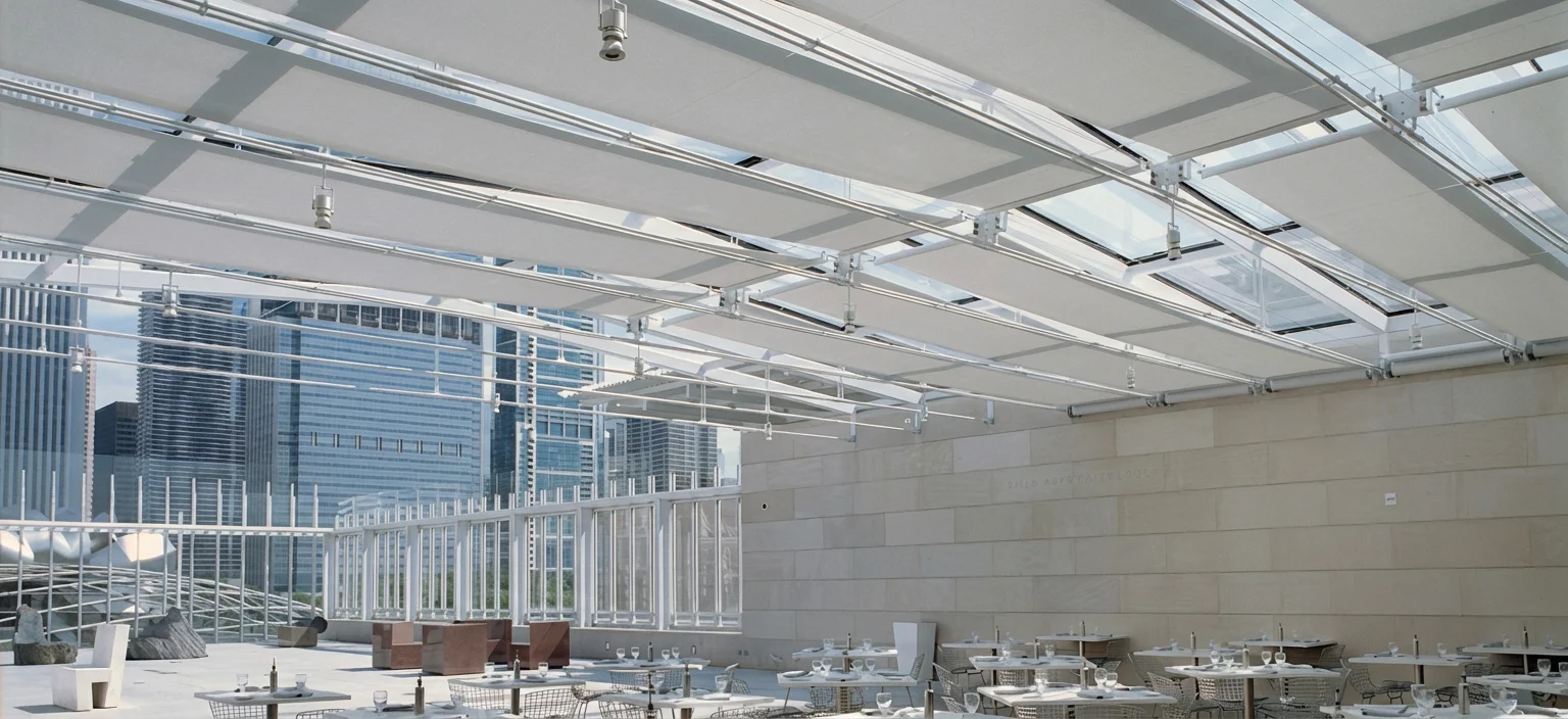 Public building atrium with motorized skylight shades
