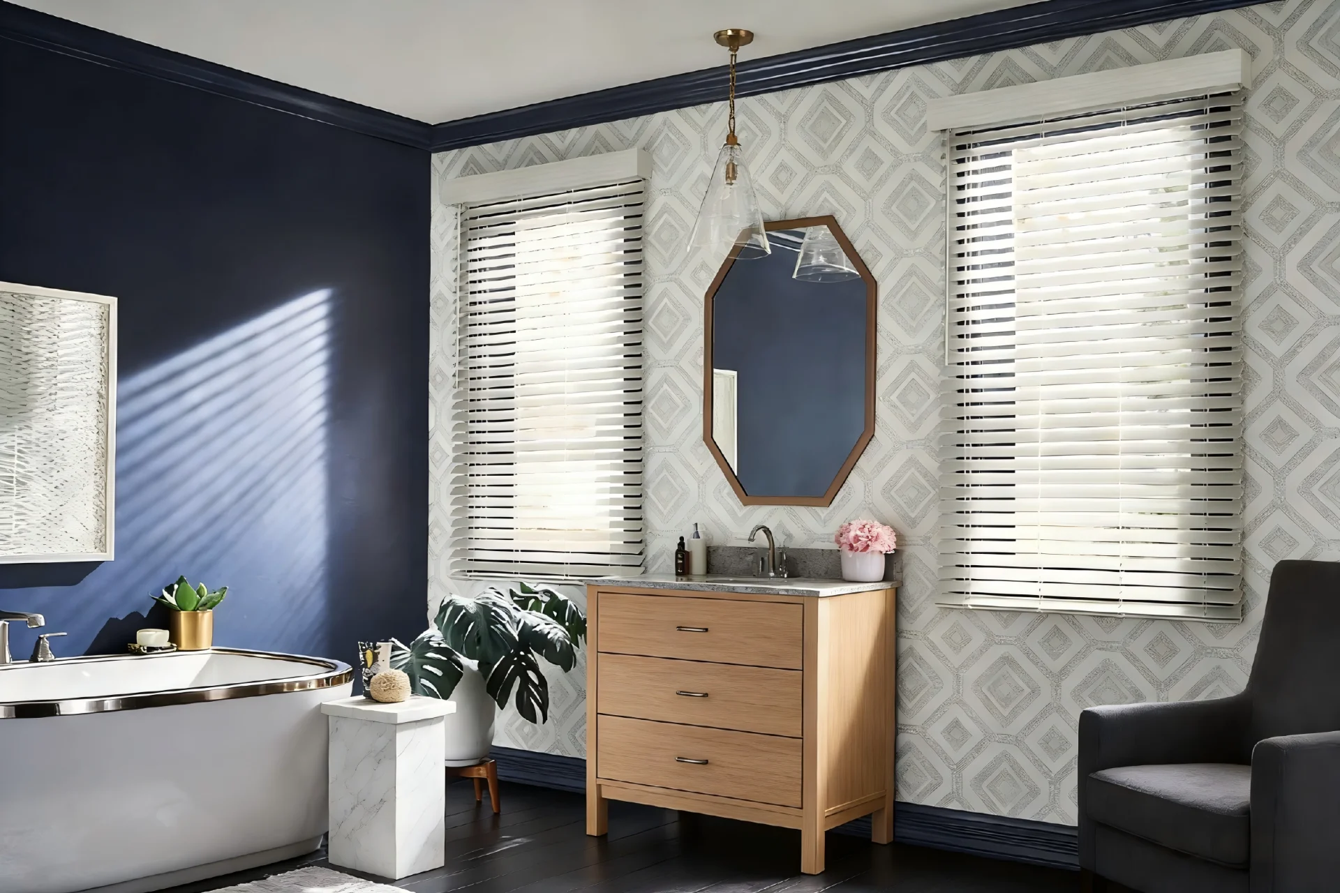 Bathroom with navy blue wall, freestanding tub, wooden vanity with mirror, potted plants and armchair.